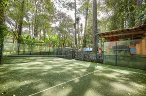 Residence with a swimming pool, paddle tennis court, and garden. - Image 3