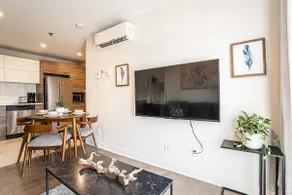 Modern Zen 2BR w/ Gym, Free Parking, DT & Airport - Image 2