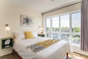 Modern Zen 2BR w/ Gym, Free Parking, DT & Airport - Image 3