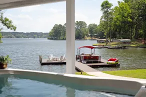 Lakefront Sleeps 12 | Dock, Swim Spa, Golf Sim, Gym, Arcade - Image 2