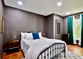 Vintage Charm Manor | Modern Luxury 2BR Suite - Image 4