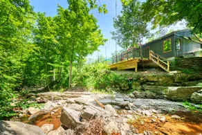 Modern Log Cabin by a Charming Babbling Brook - Image 4