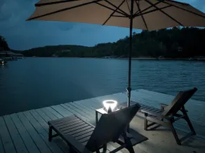 Luxurious cabin with fire pit, kayaks, and dock. - Image 5