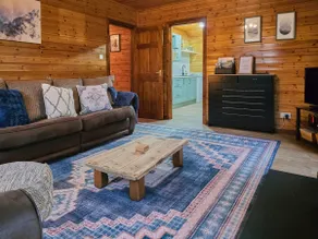 Luxury Scandi Cabin with Sauna & Woodland Garden - Image 2