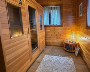 Luxury Scandi Cabin with Sauna & Woodland Garden - Image 4