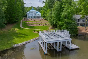 Private pool on the lake with 2 level boathouse - Image 5