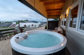 Margaret's Cabin – hot tub facing Mulroy Bay - Image 3
