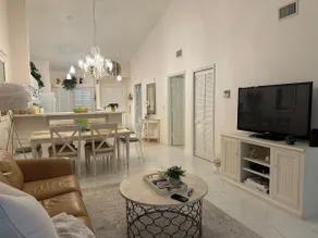 Merveilleux appartement en copropriété avec piscine chauffée, terrasse et jacuzzi | Vue jardin - Image 2