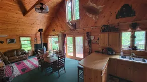 Cabin on a private lake near ATV trails - Image 2