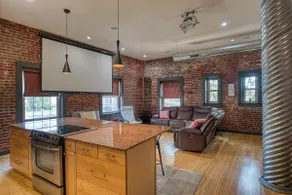 Rooftop Deck + 100” Theater | Downtown Evansville - Image 3