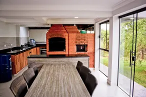 House in a gated community with a large structure - Image 3