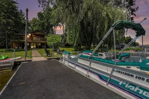Lakefront Log Cabin w/ Private Pier & Fire-pit - Image 3