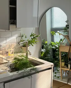 Your Isle / A private multi-story house with stone walls and plants - Image 4