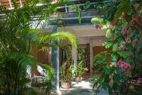 Tropical Cozy Home with Porch & Fish Pond - Image 3