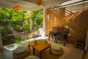 Tropical Cozy Home with Porch & Fish Pond - Image 5
