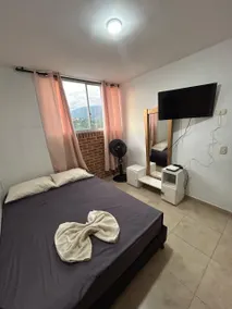 Comfortable 2-Bedroom Apartment with Pool, Gym, and Balcony - Image 2