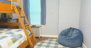 Cozy 2BR Bungalow w/Retro VHS Library & Bunk Beds - Image 5