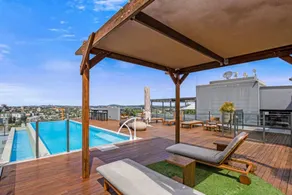 Bright and Airy 2BR Apt: Pool & Free Parking - Image 2