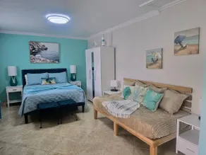 studio suite with private entrance and a patio - Image 2