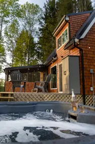 Hot tub under the stars at cozy cabin in the FLX - Image 3