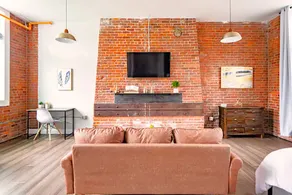 Jennifer's Stylish Downtown Brick Foundry Escape - Image 2