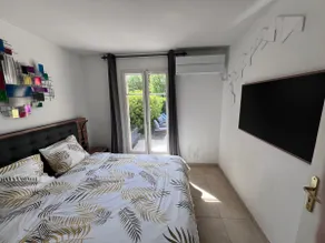Apartment with private garden, parking and swimming pool - Image 2