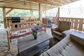 Wooden house in beautiful nature with a hot tub - Image 5