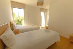 Modern 2BR Apartment with Pool, Gym & Garden - Image 5