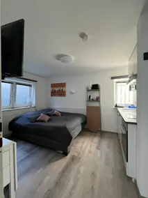 Small, quiet basement apartment near the edge of the field - Image 2