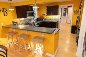 Modern home with central AC, firepit & fenced yard - Image 3
