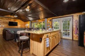 Cozy 4BR 2BA Cabin in Town near Trails. Fire Pit+ - Image 2