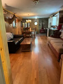 Cozy cabin nestled the woods - Image 4
