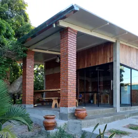 A refuge in the countryside, surrounded by a colorful garden. - Image 2