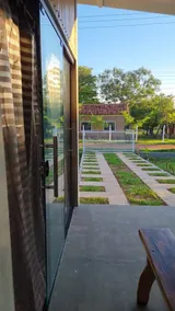A refuge in the countryside, surrounded by a colorful garden. - Image 4