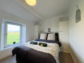 Drigg Cottage, Cosy Retreat with Log Burner & Garden - Image 4