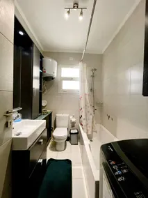 2BR Apartment with Private Garden in Downtown Rehab Near Malls - Image 4