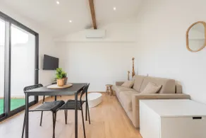 Nice air-conditioned 2-room apartment with garden and private parking - Image 4