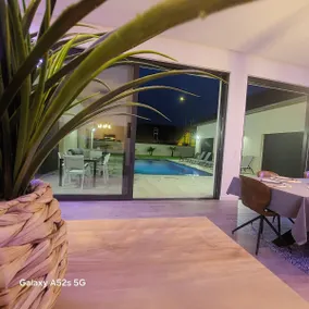 Cozy villa with Jacuzzi, pool, and home theater. - Image 5