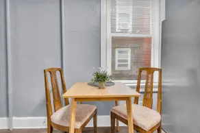 Historic Cozy Haven in Little Italy - Image 4