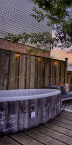 4BR Family Home with Hot Tub and Backyard - Image 4
