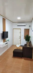 Cozy White & Kahoy Apartelle - Image 4