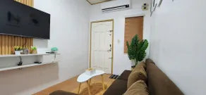 Cozy White & Kahoy Apartelle - Image 3
