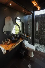 Modern cabin with lake and stone view - Image 3