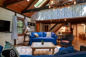 Lakeshore cabin with beach and dock - Image 3