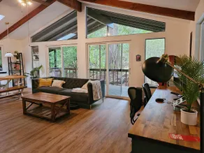 Secluded 2BR Forest Lake Retreat with Hot Tub - Image 2