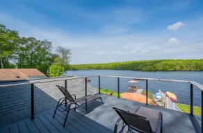 Relaxing Lakefront Retreat with Private Dock - Image 4