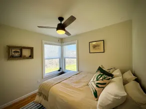 Mid-Century Cody Retreat • 2BR + Peaceful Backyard - Image 5