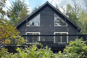 Serene Retreat by a Stream - Image 2