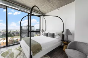 Sky-High 2BR w/ Gym & City Views - Image 3