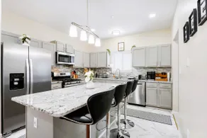 Modern 4BR Retreat with Free Parking in Prime CWE! - Image 4